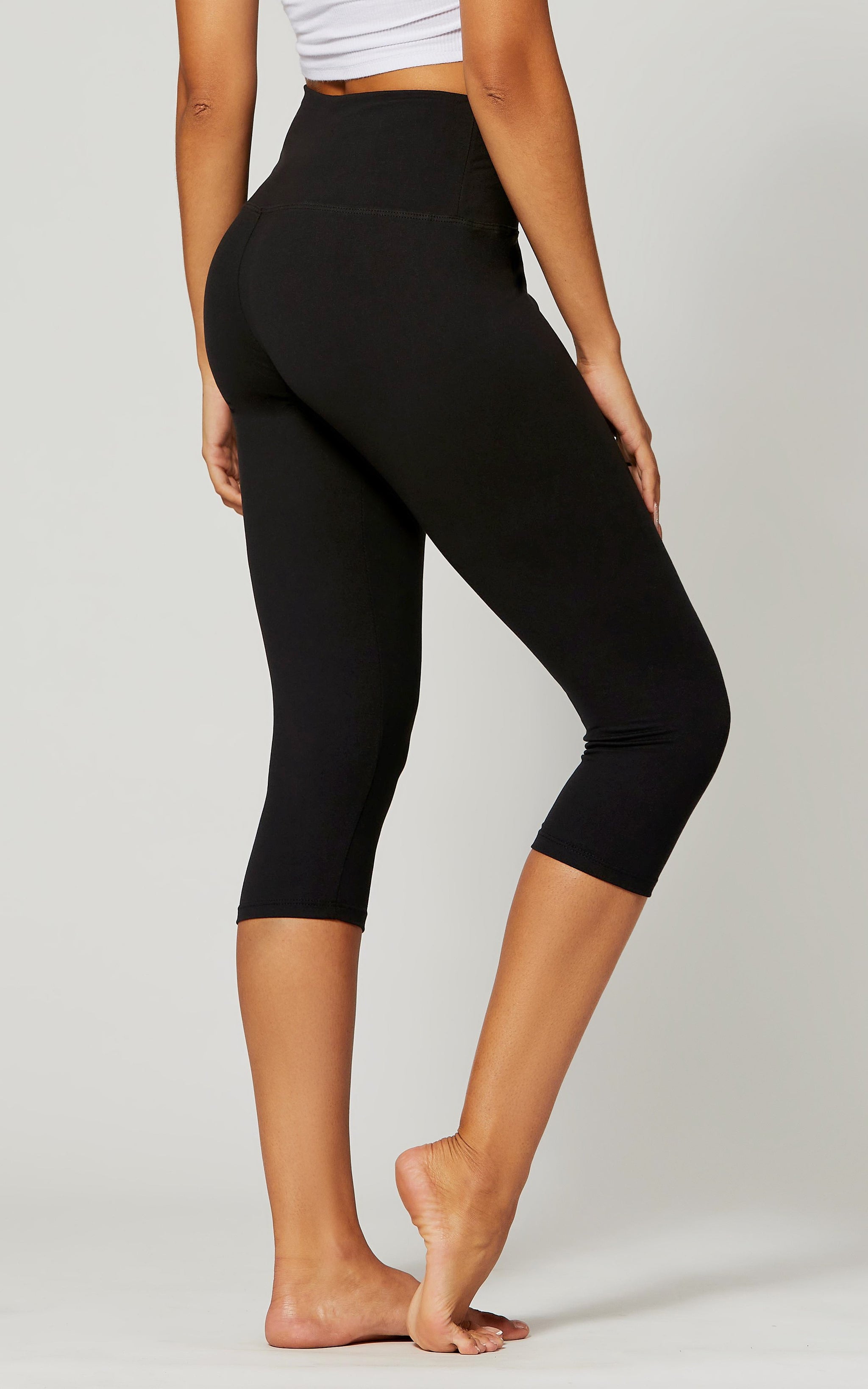 Women's Black Ripped Capri Leggings. • Elastic Waistband • Long, Skinny leg  design • Distressing accents on front • Pull Up Style • High Waisted •  Pull-on styling • Nylon/Spandex • Hand